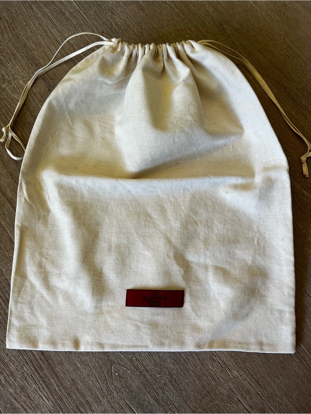Valentino Garavani Cream Drawstring Dust Bag with Red Logo Patch